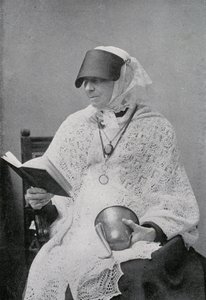 Jane Whyte Balfour, aunt of Robert Louis Stevenson, reading and holding an ear trumpet by British Photographer